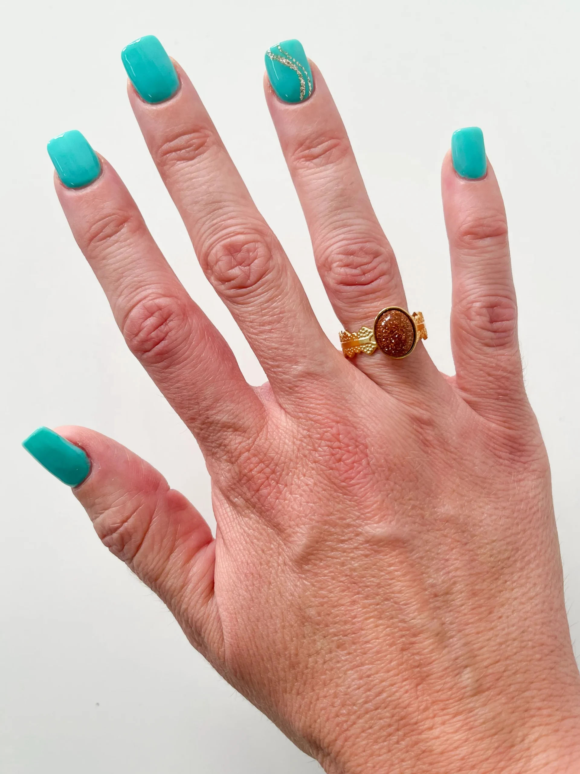 Anillo óvalo marrón purpurina