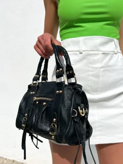 Bolso hebillas piel brillos negro
