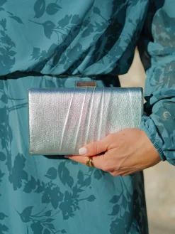 Clutch bandas plateado