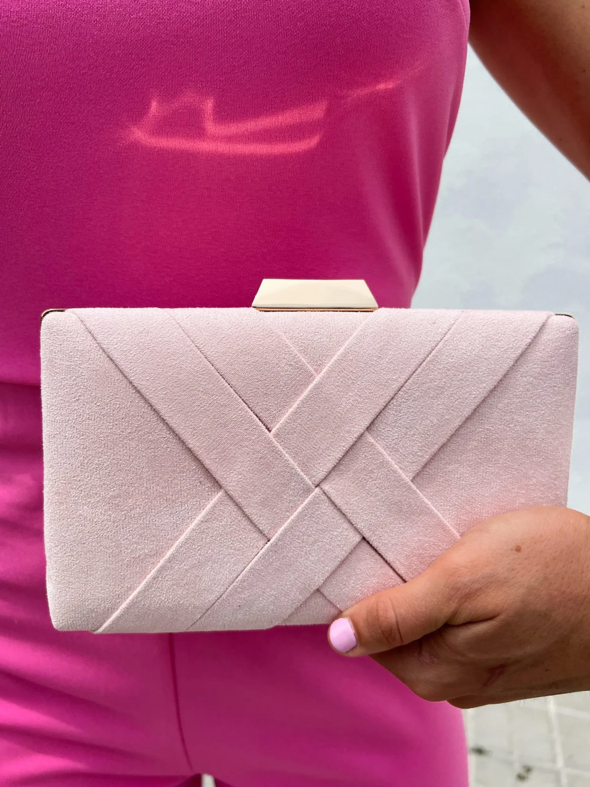 Clutch trenzado rosa